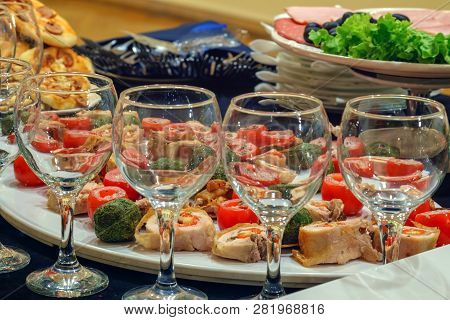 Empty Glasses With Mixed Vegetables On The Plate Background