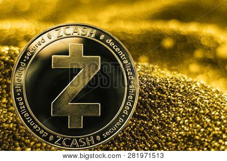 Coin Cryptocurrency Zcash And Gold Fabric Background. Zec