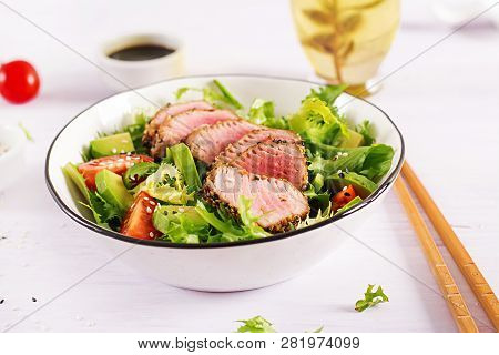 Tuna Salad. Japanese Traditional Salad With Pieces Of Medium-rare Grilled Ahi Tuna And Sesame With F