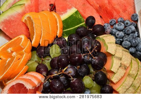 Slide Pieces Of Fruit Melon Orange Apple Grap Wine