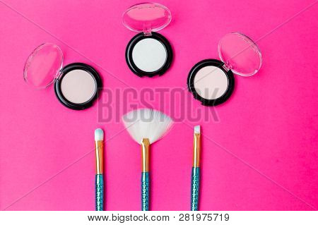 Makeup Brushes Mermaid Tail  And Eye Shadow On A Bright Pink Background. Flat Lay