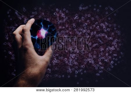 Human Hand Holding Cell Dividing. Nebula Dust. Mixed Media.
