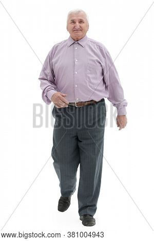 full length gait of an old gray-haired man on a white background