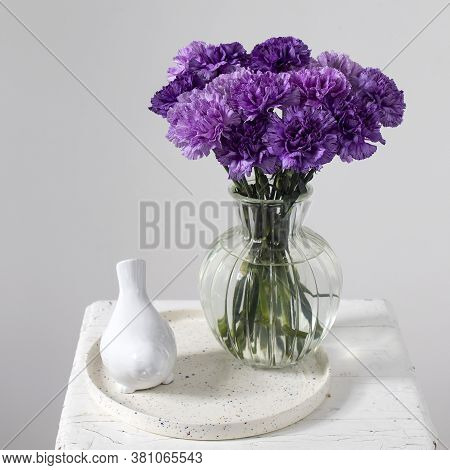 Bridal Bouquets Of Lilac Carnations In A Four Round Glass Vases Different Sizes As Table Decoration