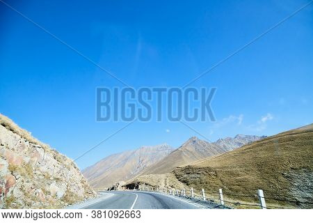 Tbilisi, Georgia - October 25, 2019: Car Vindow, Hand Of Woman On Steering Wheel And View To The Roa