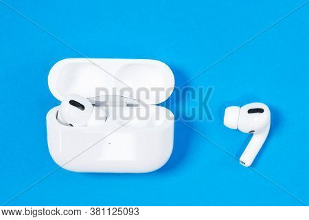 Rostov, Russia - July 06, 2020: Wireless Headphones Apple Airpods Pro In Opened Charging Case With A
