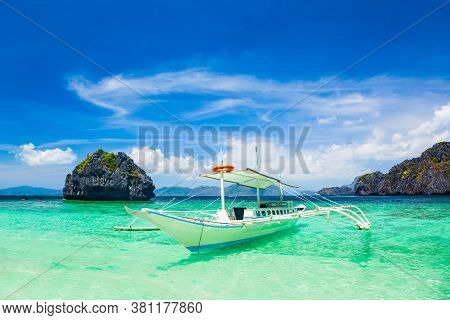 Traditional Filipino Boat Bangka Or Banca In El Nido Province, Palawan Island In Philippines