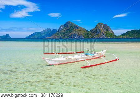 Traditional Filipino Boat Bangka Or Banca In El Nido Province, Palawan Island In Philippines