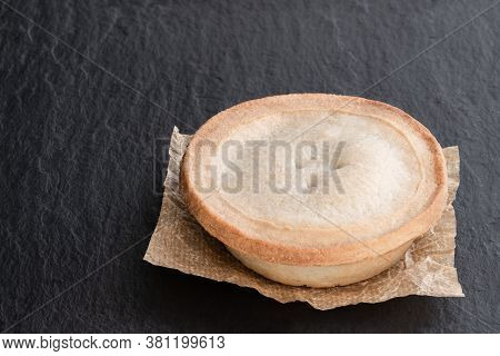 Pukka  Pie Pasty On Black Stone Background