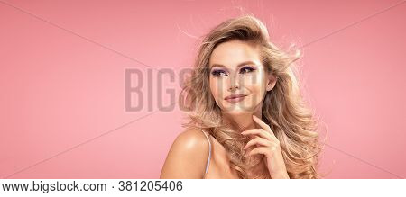 Blond Girl With Glamour Makeup.