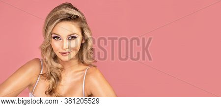 Blond Girl With Glamour Makeup.