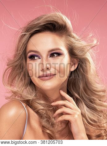 Blond Girl With Glamour Makeup.