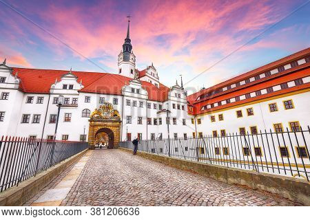 Astonishing Autumn View Of Hartenfels Castle On Banks Of The Elbe. Picturesque View Of Torgau Town. 