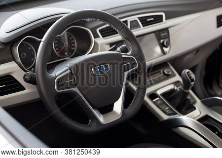 Russia, Izhevsk - August 14, 2020: Geely Showroom. Interior Of New Modern Car Geely Atlas With Manua