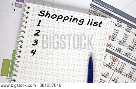 Text Shoping List. Financial Planning On Notebook