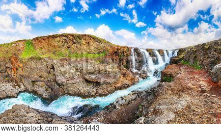 Majestic Kolufossar Waterfall At Summer Sunny Day.  Popular Tourist Travel Destination In Iceland . 