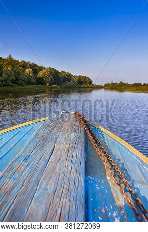 Belarussian Travel Destinations. The Pripyat River With Motorboat Passing Along The Shore.