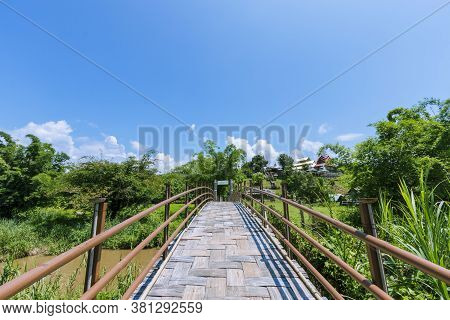 Sutongpe Wooden Bridge That Crosses Rice Fields To Temples In Mae Hong Son Province In Thailand.