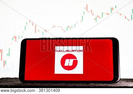 Tula, Russia - August 10, 2020: Logo Halliburton On A Smartphone Against The Background Of Stock Mar