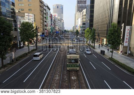 August 5, 2020, Hiroshima, Japan - A Hiroshima Streetcar (hiroden) Run-pass, Through Hondori Street.