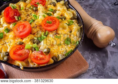 Delicious Pasta And Cheese Casserole In A Cast Iron Skillet