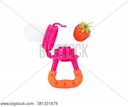 Baby's Nibbler And Ripe Strawberry On White Background