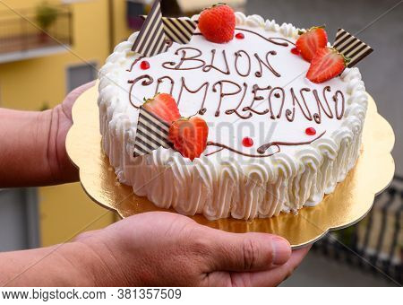 Traditional White Italian Birthday Cake With Congratilations, Buon Compleanno Means Happy Birthday C