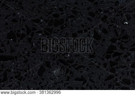 Excellent Black Synthetic Stone Background Close Up.