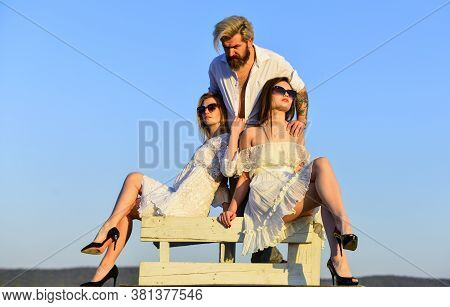 Rooftop Party. Stylish Hipster And Women White Clothes. Women And Man Cuddling. Summer Holidays. Rel