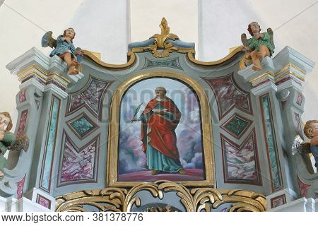 BRDOVEC CROATIA - SEPTEMBER 17, 2012: St. Lucia altar painting on the main altar in St. Vitus Church in Brdovec, Croatia