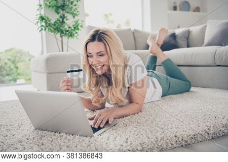 Photo Of Domestic House Wife Lady Relaxing Lying Floor Near Couch Browsing Notebook Remote Work Hold