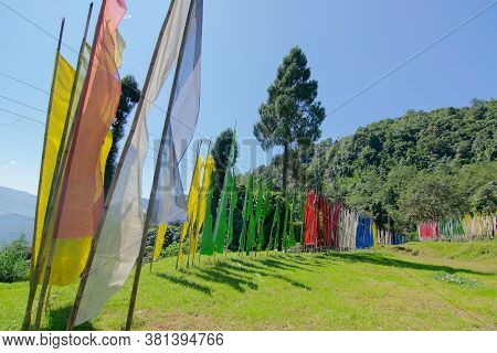 Buddhist Religious Flags Waving In Breeze , In Memories Of The Departed Souls, At Rinchenpong Monast