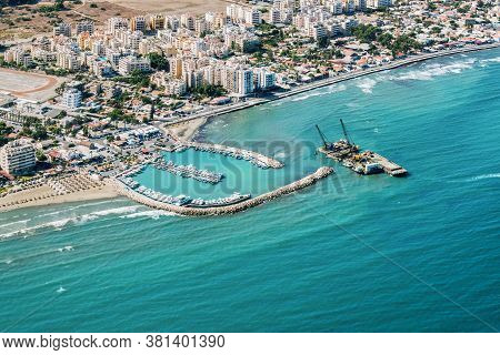 Sea Port City Of Larnaca, Cyprus. View From The Aircraft To The Coastline, Beaches, Seaport And The 