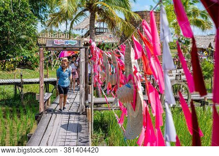 Pattalung, Thailand - March 07, 2020 : People Walking Sightseeing, Tourist Attractions, Community Wa