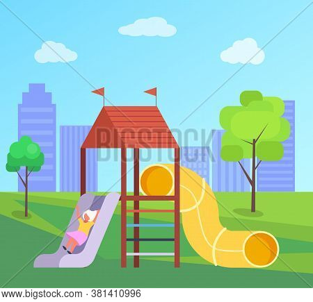 The Girl Rolls Down The Slide, Children S Shell For Games. A Roll Pipe. Child Plays In Summer Park. 