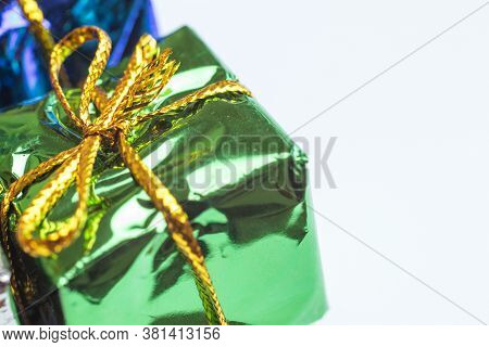 Green Present Bix With Copy Space On White Background. Christmas Or Birthday Gift.