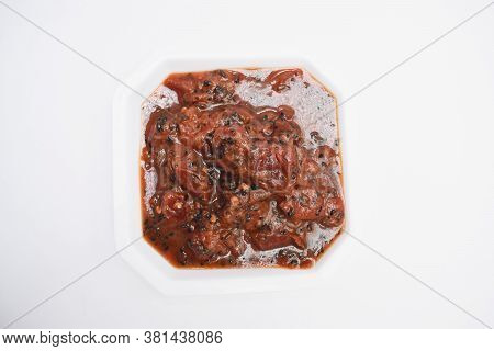 Plum Chutney Sweet And Tangy Indian Chutney With Little Spice From Tempered Tadka In White Backgroun