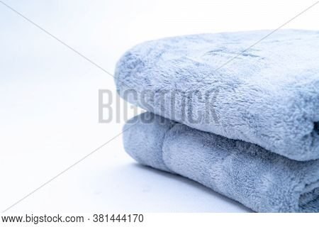 Folded Blue Coral Fleece Throw Isolated On White Background