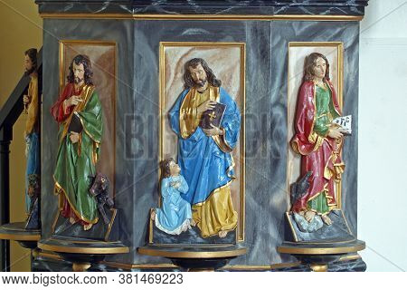 KLANJECKO JEZERO, CROATIA - NOVEMBER 06, 2013: Evangelists, statues at the pulpit in the chapel of Saint George at the Lake in Klanjecko Jezero, Croatia