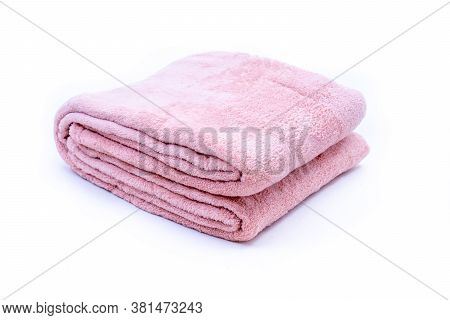 Folded Red Coral Fleece Throw Isolated On White Background