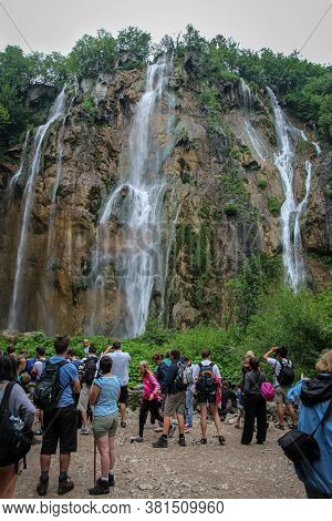 Plitvice Lakes, Croatia - July 14th 2018: Tourists Overcrowding At A Large Waterfall At Plitvice Lak