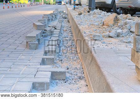 Repair Work In The Pedestrian Zone Of The Residential Complex. Engineering Works. Laying Of Paving S
