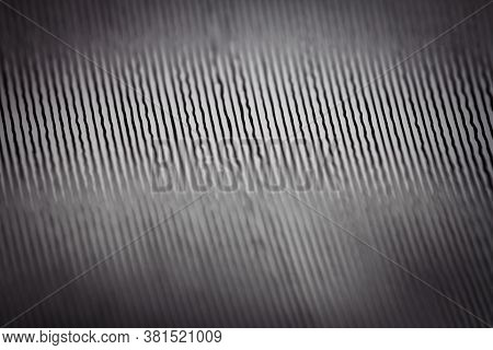 Macro Shot Of Black Vinyl Record. Surface Of An Old Vinyl Record. Shallow Deph Of Field.