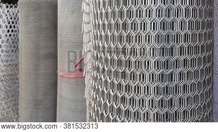 Pile Of Metal Mesh Or Fence Rolls With Selective Focus