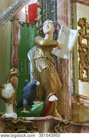 GORNJI DRAGANEC, CROATIA - OCTOBER 02, 2011: St. John the Evangelist statue at the pulpit at the Church of the Visitation of the Blessed Virgin Mary in Gornji Draganec, Croatia