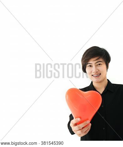 Asian Sporty Woman Short Hair Holding Red Heart Abstract  Love Balloon White Copy Space