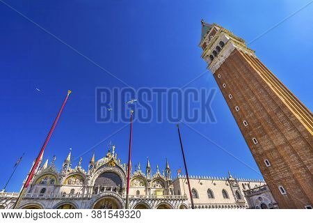 The Campanile Bell Tower In The Piazza San Marco Saint Mark's Square In Venice Italy Is Majestic.  T