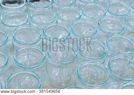 Glass Jar Empty Glasses Row For Jam Honey With Lid Caps Abstract Background