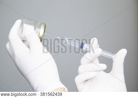 Syringe With Vaccine\preventing The Coronavirus Or Covid-19 Pandemic