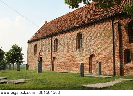 Ezinge.august-16-2020.the Church Of Ezinge And Gravestones From The 13th Century In The Village Ezin